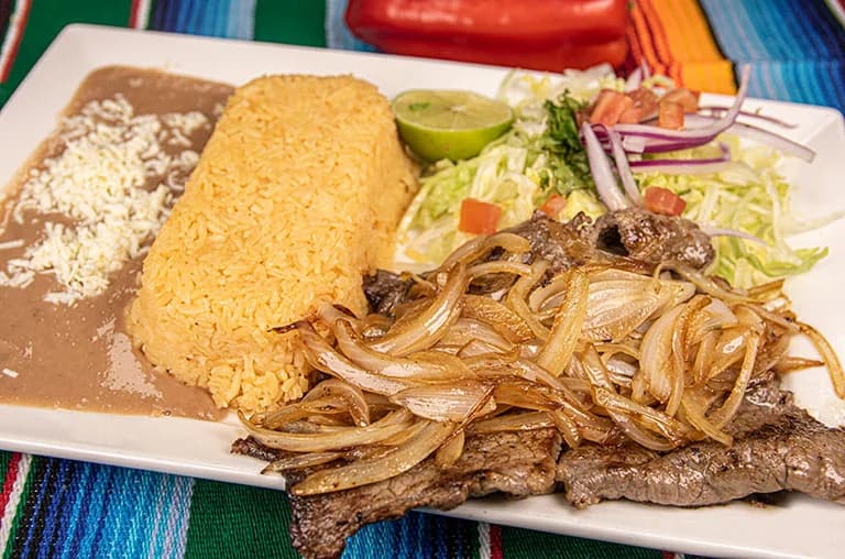 Bisteck Encebollado